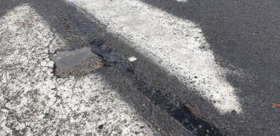 How to fix potholes and cracks in asphalt